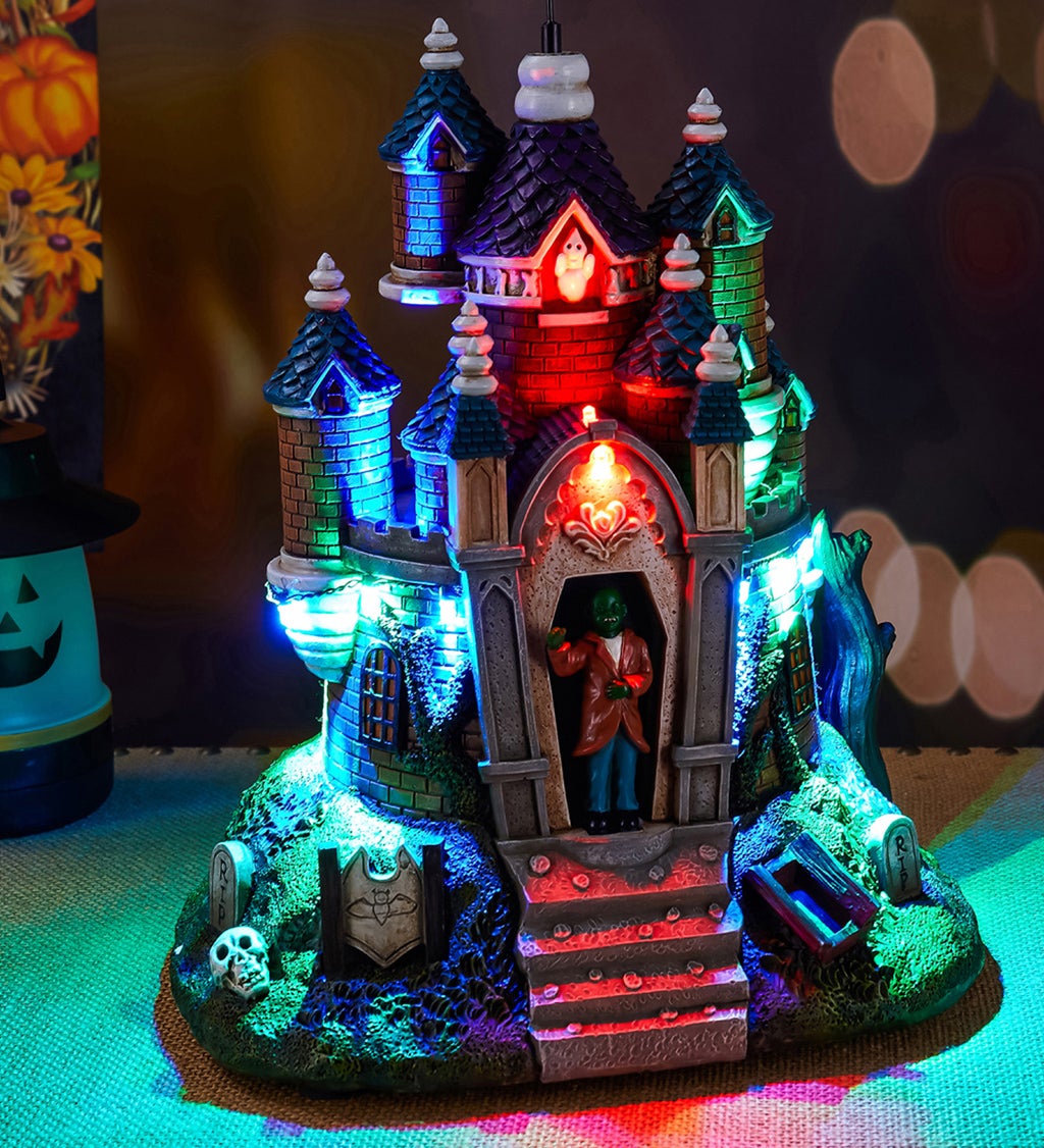 LED Animated Polyresin Haunted Castle with Flying Witch and Cackling Sound Table Decor